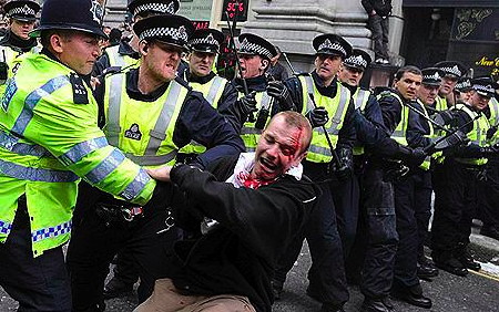 a body registers fear in a localized impact of "necessary force" / g20 protests, london